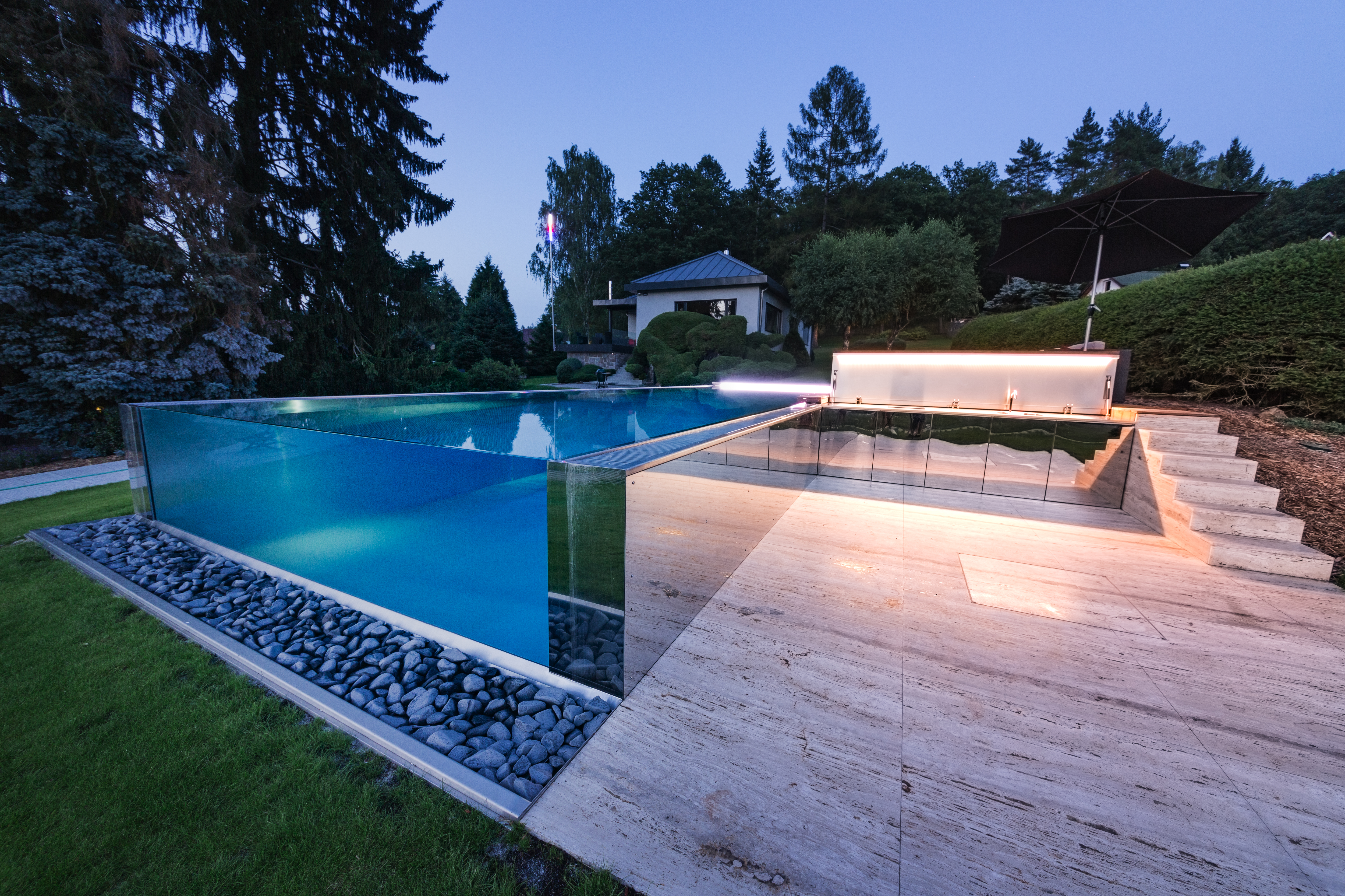 Glass as a unique design accessory that raises the pool to a higher visual level | IMAGINOX GROUP