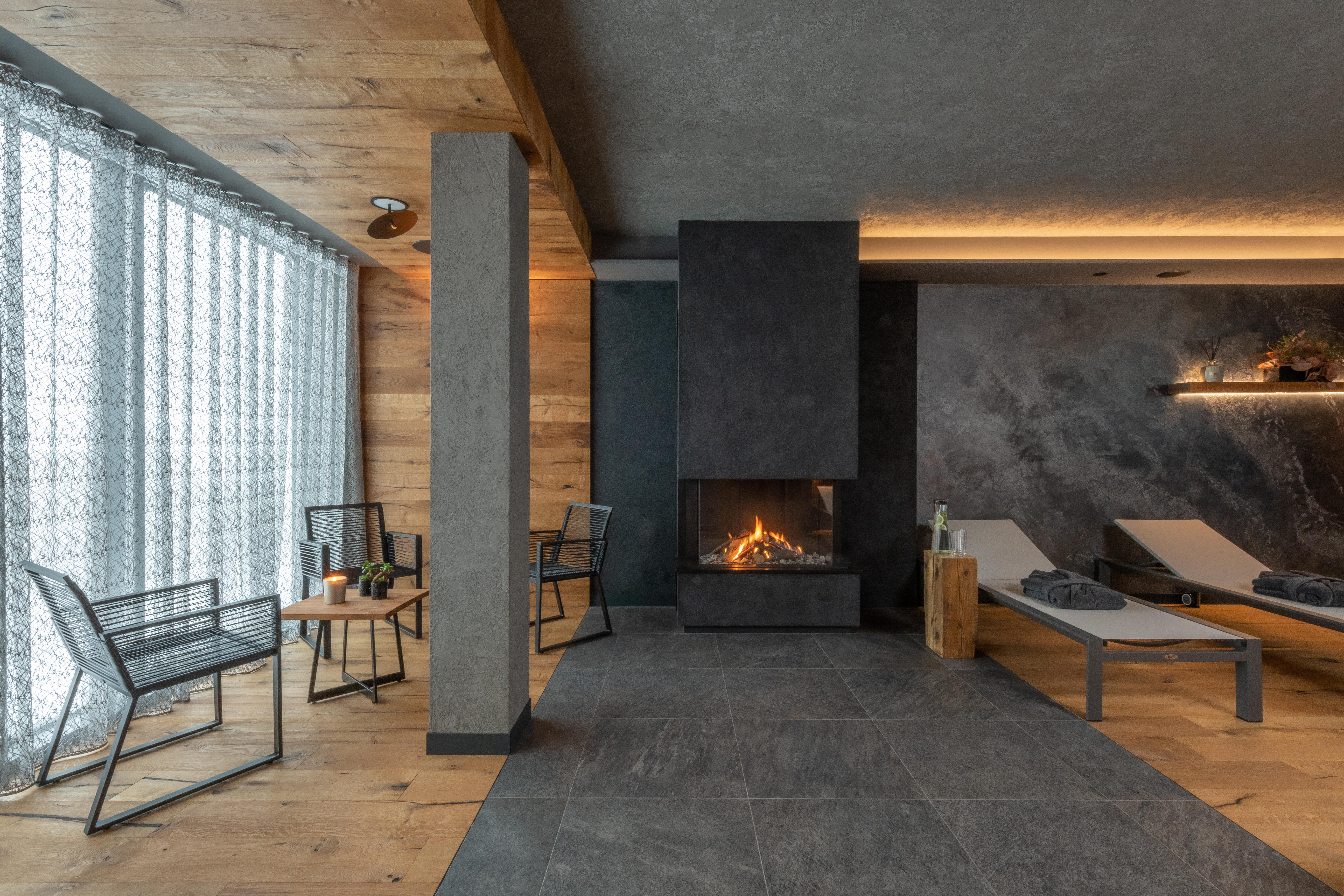 Luxury wellness hotel with fireplace in spa rest area
