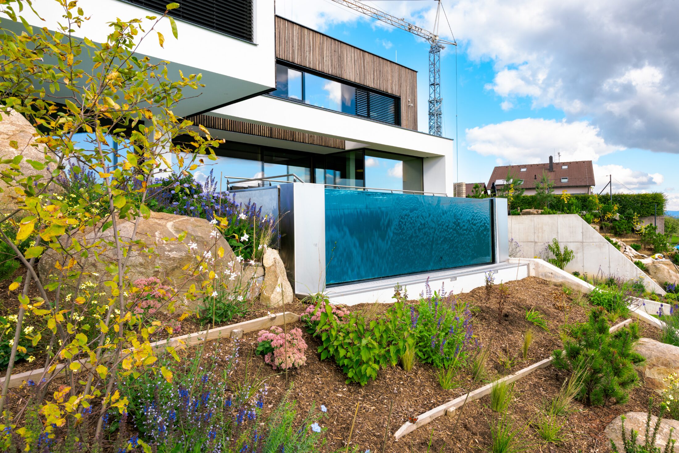 Imaginox | Stainless Steel Infinity Pool as an Architectural Centrepiece of a Modern Garden