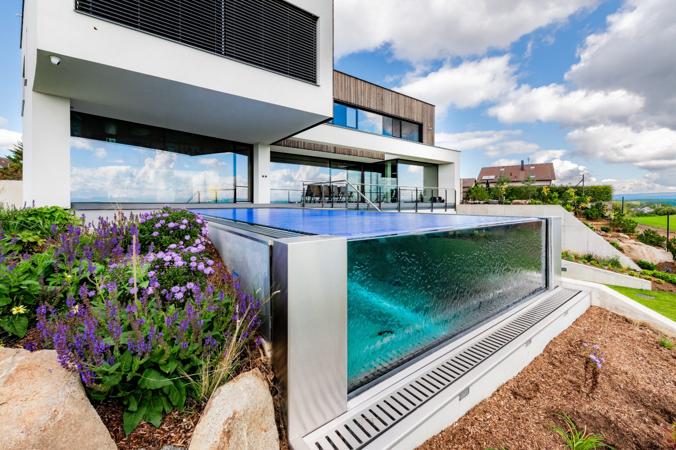 Imaginox | Stainless Steel Infinity Pool as an Architectural Centrepiece of a Modern Garden
